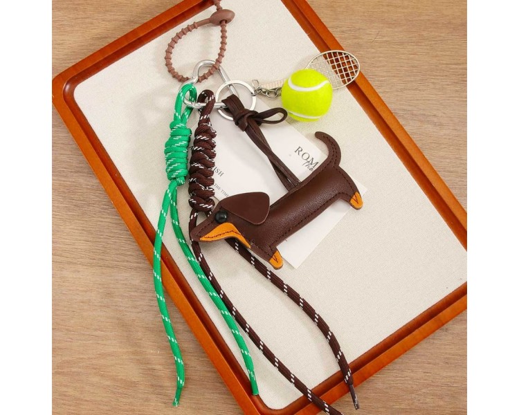 Pendentif de sac clé avec chien et tennis