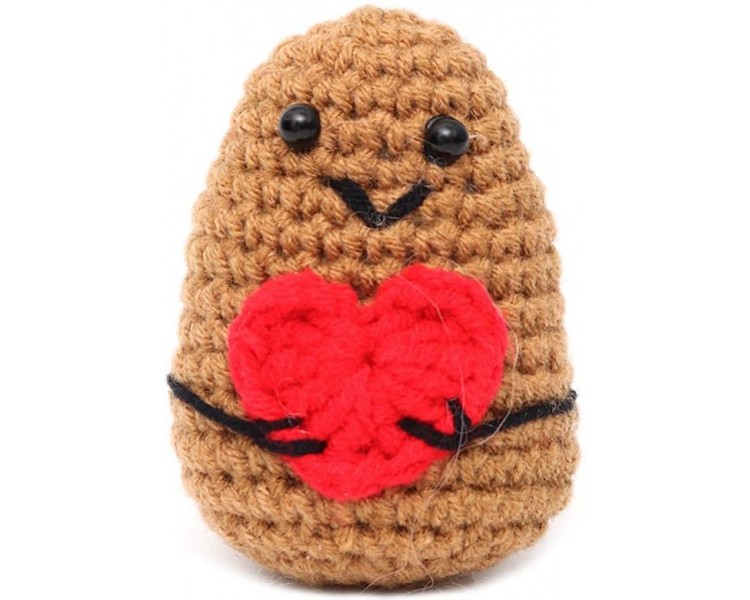 Pomme de terre positive faite à la main avec un cœur
